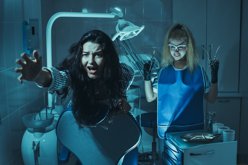 Patient and dentist dressed for Halloween fighting dental anxiety